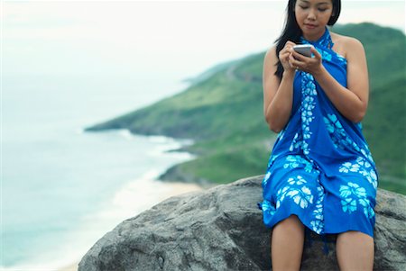 Woman Using Palm Pilot, St Kitts, Caribbean Stock Photo - Rights-Managed, Code: 700-00478718