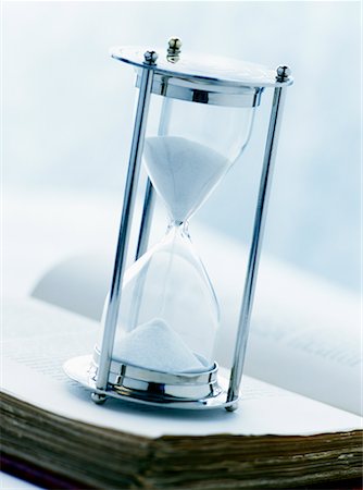 Hourglass on Top of Book Stock Photo - Rights-Managed, Code: 700-00478825