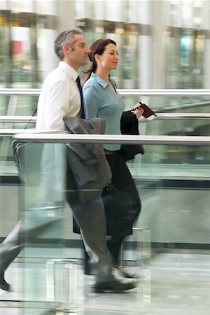 Businessman and Businesswoman at Airport Stock Photo - Rights-Managed, Code: 700-00506906