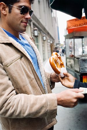 Man Buying Pretzel, New York, New York, USA Stock Photo - Rights-Managed, Code: 700-00514237