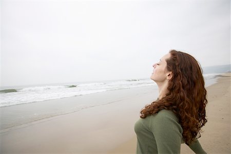 Sad Woman In A Sailor's Striped Vest Praying. Profile View. Retouched  Image. Vignette Is Added. Stock Photo, Picture and Royalty Free Image.  Image 59278248.