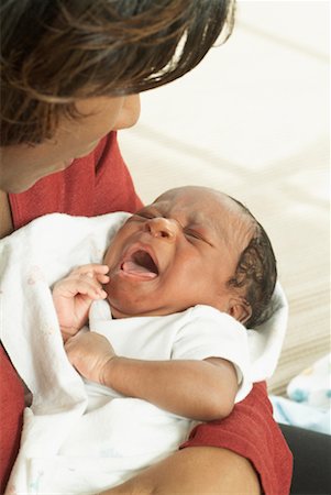 Mother Holding Crying Newborn Stock Photo - Rights-Managed, Code: 700-00515150