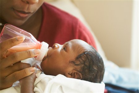 Mother Feeding Newborn Baby Stock Photo - Rights-Managed, Code: 700-00515151