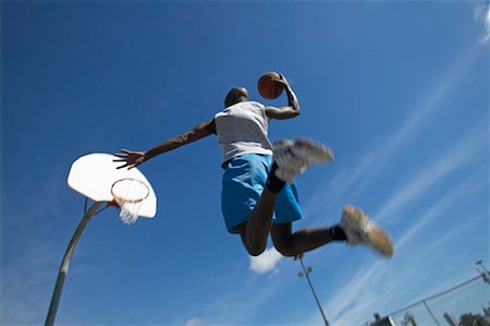 Man Playing Basketball Stock Photo - Rights-Managed, Code: 700-00515271