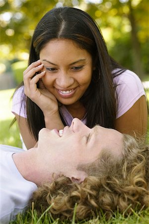 Couple Lying in Grass Stock Photo - Rights-Managed, Code: 700-00515285
