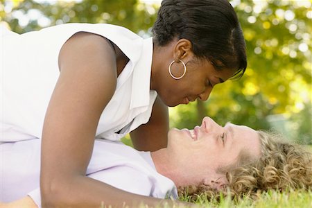 Couple Lying in Grass Stock Photo - Rights-Managed, Code: 700-00515281