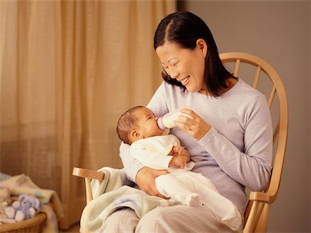 Mother Feeding Baby Stock Photo - Rights-Managed, Code: 700-00515592