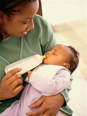 plus sized woman sleeping - Mother Feeding Baby Stock Photo - Rights-Managed, Code: 700-00515605