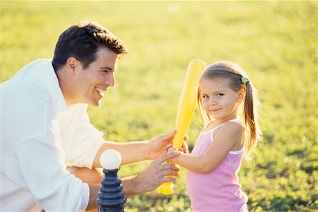 Père joue T-ball avec fille Photographie de stock - Rights-Managed, Code: 700-00515627