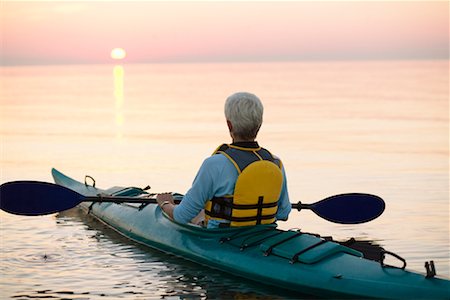 senior citizens kayaking - Woman Kayaking Stock Photo - Rights-Managed, Code: 700-00517615