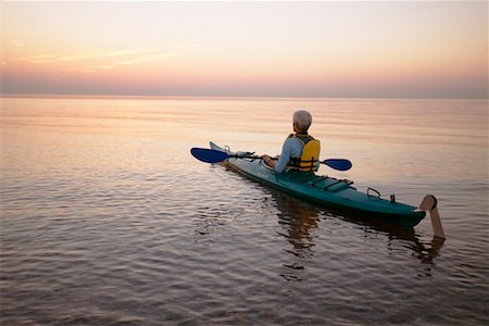 senior citizens kayaking - Woman Kayaking Stock Photo - Rights-Managed, Code: 700-00517620