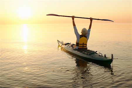 senior citizens kayaking - Woman Kayaking Stock Photo - Rights-Managed, Code: 700-00517621