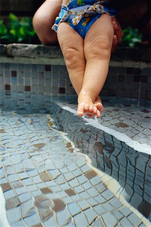 simsearch:700-00518639,k - Mother Holding Baby Over Pool Stock Photo - Rights-Managed, Code: 700-00517684