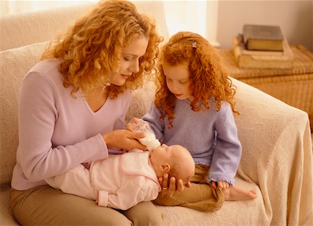 simsearch:700-03615562,k - Mother Feeding Baby with Daughter Stock Photo - Rights-Managed, Code: 700-00517734