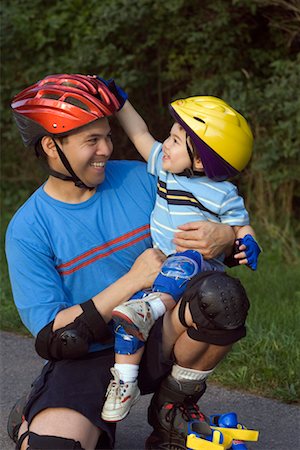 Father and Son In-Line Skating Stock Photo - Rights-Managed, Code: 700-00518626