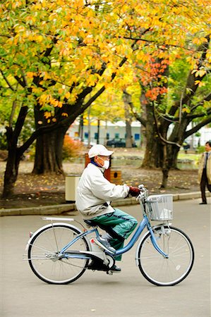 Man Riding Bicycle, Sapporo, Hokaido, Japan Stock Photo - Rights-Managed, Code: 700-00518746