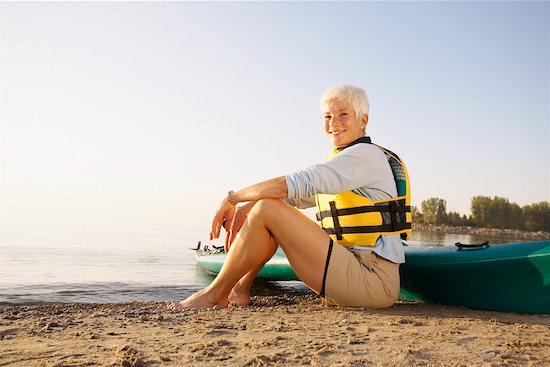 Portrait of Woman with Kayak Stock Photo - Premium Rights-Managed, Artist: Peter Griffith, Image code: 700-00518896