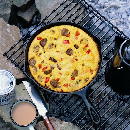 Sausage Cornbread in Pan over Open Fire Stock Photo - Rights-Managed, Code: 700-00518941