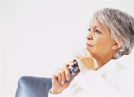 profile 40s woman head and shoulders one person studio shot side view - Woman with Cellular Phone Stock Photo - Rights-Managed, Code: 700-00519249