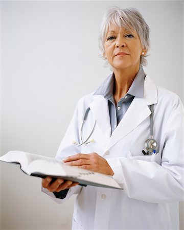 stethoscope on books - Portrait of Doctor Stock Photo - Rights-Managed, Code: 700-00519258