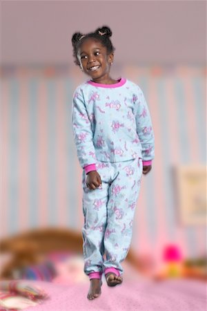 simsearch:700-00617143,k - Child Jumping on Bed Foto de stock - Con derechos protegidos, Código: 700-00519352