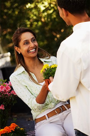 Couple in Back of Pickup Truck With Flowers Stock Photo - Rights-Managed, Code: 700-00524201