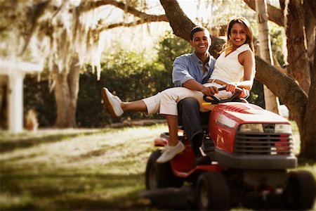 Couple on Riding Mower Stock Photo - Rights-Managed, Code: 700-00524202