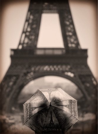 eiffel dusk - Person with Umbrella Looking at Eiffel Tower, Paris, France Stock Photo - Rights-Managed, Code: 700-00524376