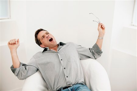 Man Stretching and Yawning Stock Photo - Rights-Managed, Code: 700-00524467