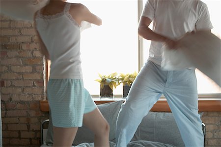 Couple Having Pillow Fight Stock Photo - Rights-Managed, Code: 700-00524490