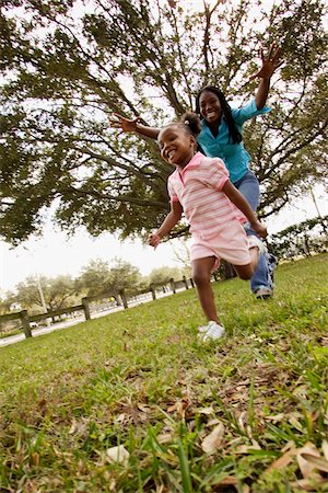 Mother and Daughter Running Stock Photo - Rights-Managed, Code: 700-00524519