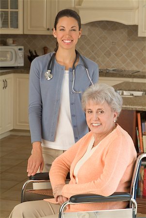 disabled person at physiotherapy - Portrait of Senior and Home Care Worker Stock Photo - Rights-Managed, Code: 700-00524907