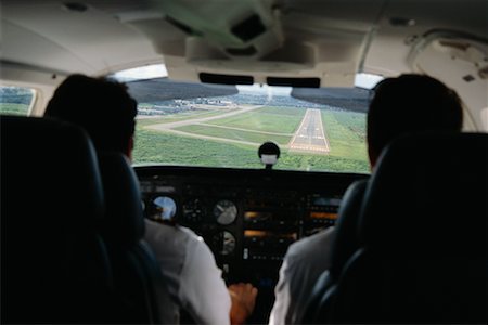plane runway people - Landing Small Plane Stock Photo - Rights-Managed, Code: 700-00524924