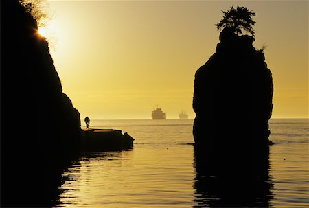 stanley park - Siwash Rock at Sunset, Vancouver, British Columbia, Canada Foto de stock - Con derechos protegidos, Código: 700-00526944