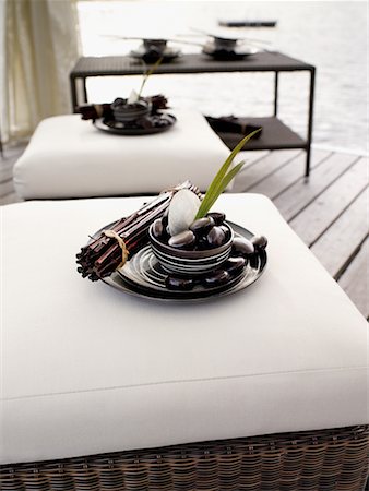 resort service - Bowl With Rocks and Plant on Patio Furniture Stock Photo - Rights-Managed, Code: 700-00526984