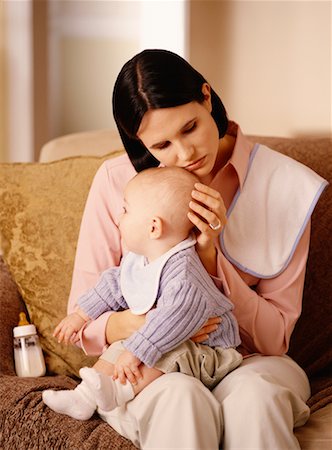 serious mother holding baby - Mother and Baby Stock Photo - Rights-Managed, Code: 700-00527304
