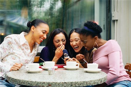 portrait photo of people socialising in a cafe - Friends Reviewing Photos on Camera Phone Stock Photo - Rights-Managed, Code: 700-00527820