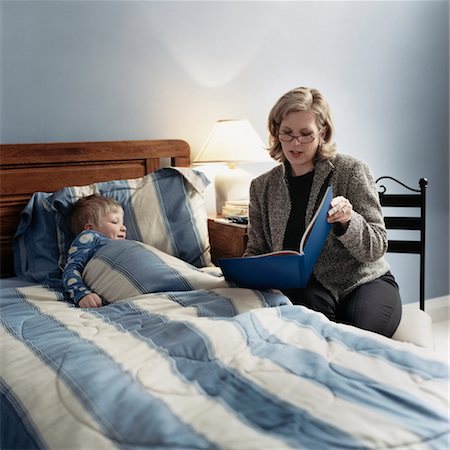 Mother Reading A Bedtime Story to Her Son Stock Photo - Rights-Managed, Code: 700-00527880