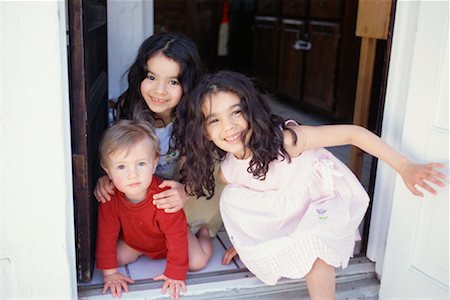 simsearch:600-07434963,k - Children in Doorway Stock Photo - Rights-Managed, Code: 700-00528002