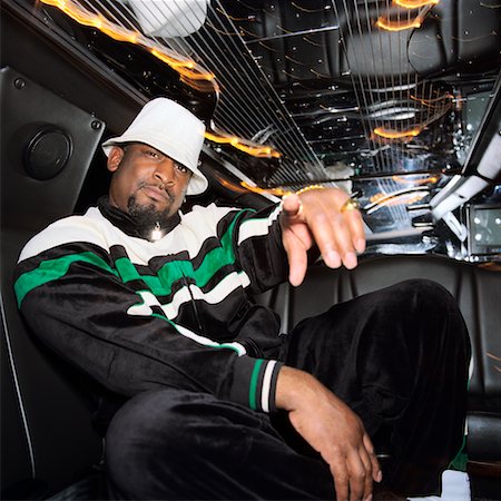 Rapper in Back of Limousine Stock Photo - Rights-Managed, Code: 700-00528146
