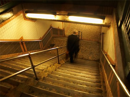 Man Descending Stairs Stock Photo - Rights-Managed, Code: 700-00528216