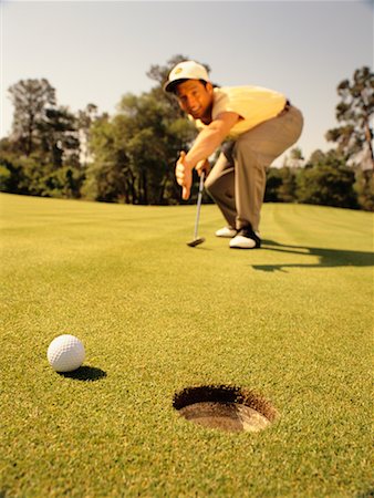 picture of people looking for lost golf ball - Man Golfing Stock Photo - Rights-Managed, Code: 700-00528373