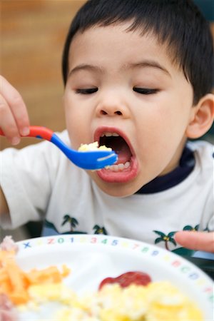 Child Eating Stock Photo - Rights-Managed, Code: 700-00528930