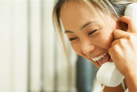 Woman Using Telephone Stock Photo - Rights-Managed, Code: 700-00529113