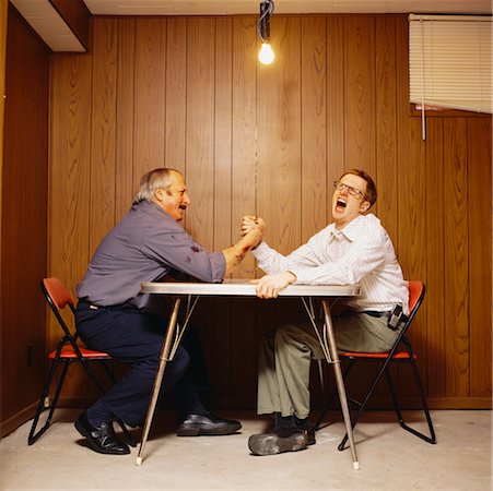 electricity humor - Men Arm Wrestling Stock Photo - Rights-Managed, Code: 700-00529189