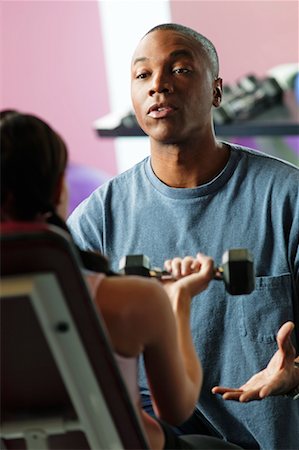 spotting at the gym - Portrait of Personal Trainer Stock Photo - Rights-Managed, Code: 700-00529182