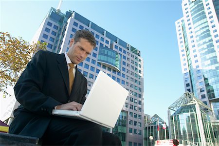 simsearch:700-00032848,k - Businessman Using Laptop Stock Photo - Rights-Managed, Code: 700-00529287
