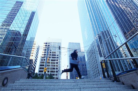 run stair - Businessman Rushing to Work Stock Photo - Rights-Managed, Code: 700-00529298