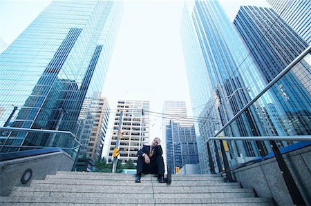 Businessman Sitting on Steps Stock Photo - Rights-Managed, Code: 700-00529301