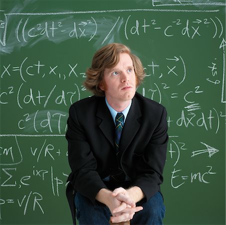 Portrait of Man in Front of Chalkboard Stock Photo - Rights-Managed, Code: 700-00529408